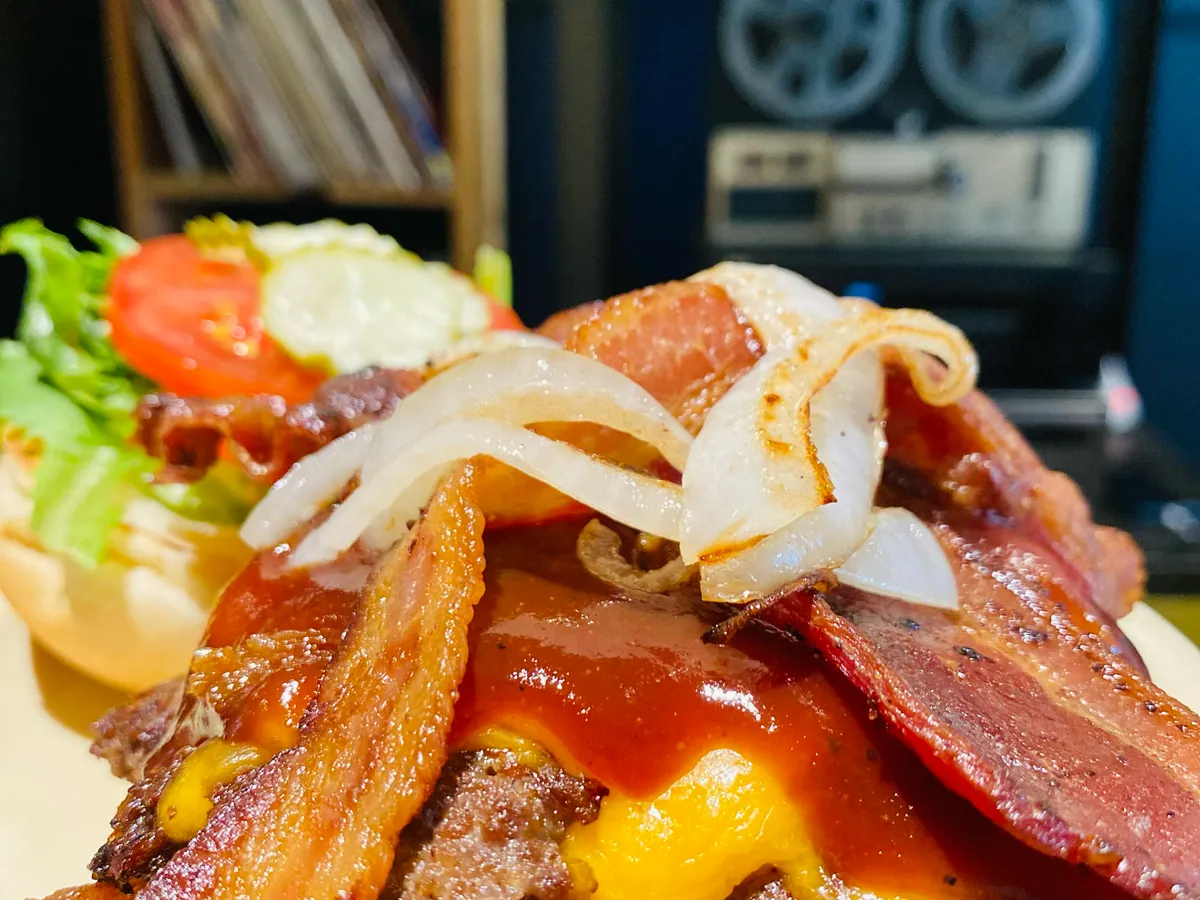 A bacon cheeseburger up close
